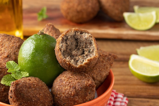 Focus on Arabian kibbeh with lemon