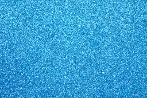 Focused blue abstract glitter background