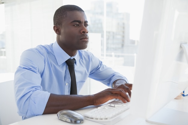 Focused businessman working at his desk