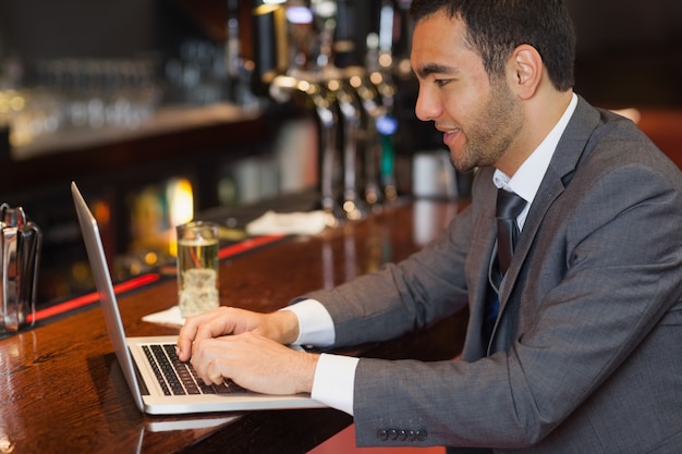 Focused businessman working on his laptop