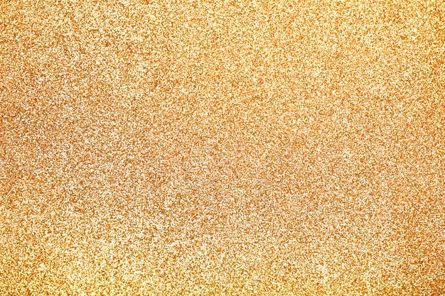 Focused golden texture glitter background