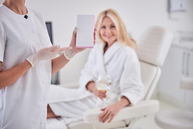 Focused image of white notebook in doctor hands