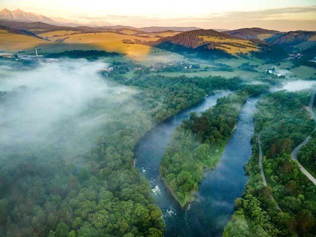 Fog and Mist at Sunrise Over Dunajec River in Pieniny Poland Aerial Drone View