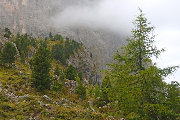 Foggy mountain landscape in Dolomites in Italy