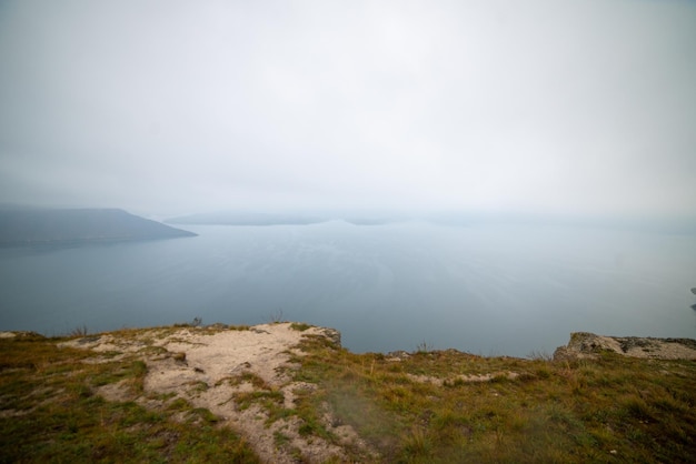 Foggy river with cliff landscape