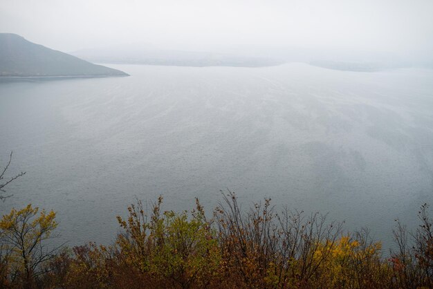 Foggy river with cliff landscape