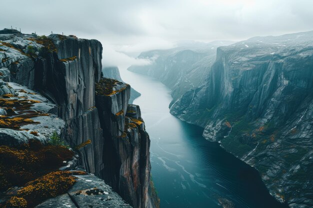 Photo a foggy view of the preikestolen cliff in norway