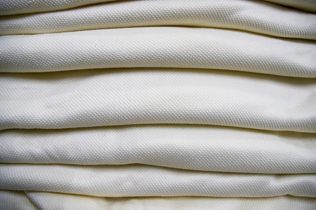 Folded stacked sherpa fabric backdrop pattern textured can be used as a background wallpaper