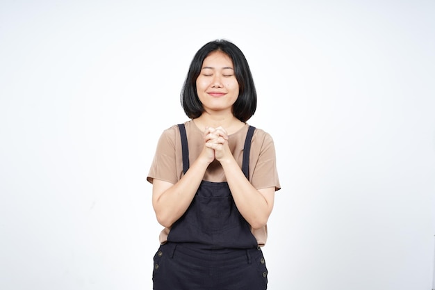 Folding hand closed eye and pray Of Beautiful Asian Woman Isolated On White Background