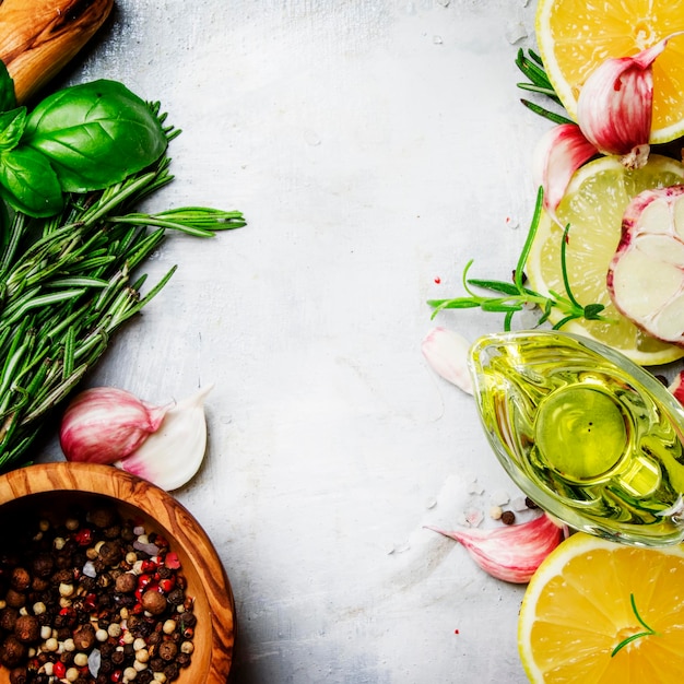 Food background spices herbs olive oil and seasonings top view