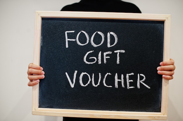 Food gift voucher written on chalkboard