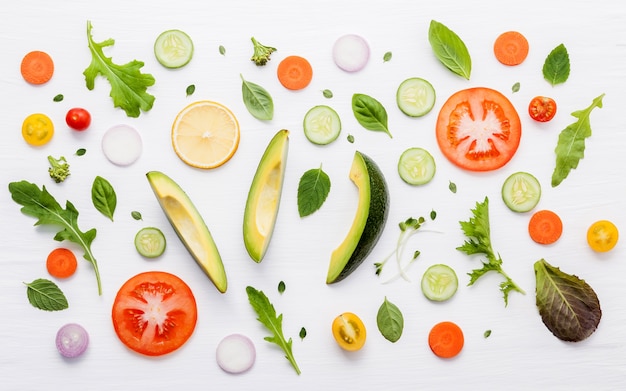 Food pattern with raw ingredients of salad flat lay