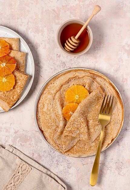 Food photography of crepes with blood orange