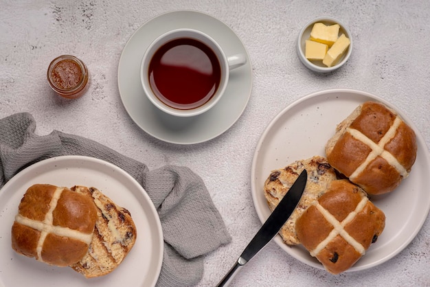 Food photography of hot cross buns and tea