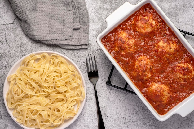 Food photography of meatball and tagliatelle