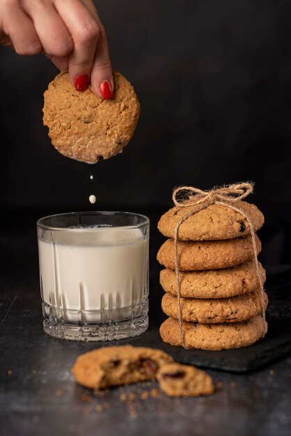 Food photography of oatmeal cookies and glass of milk