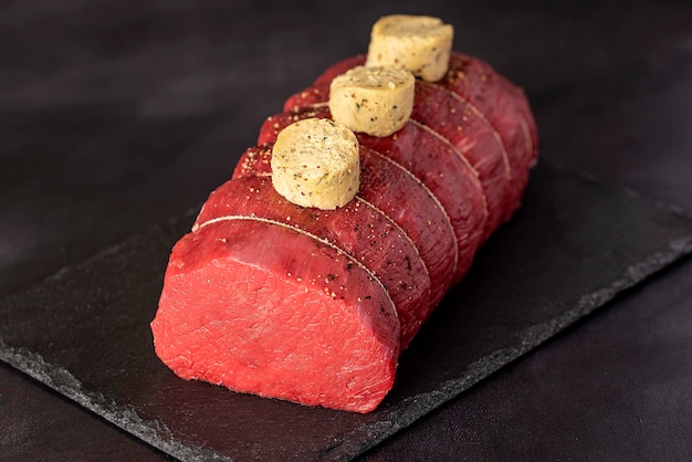 Food photography of raw beef and butter