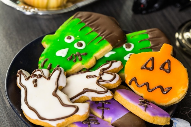 Food table arrangement prepared for Halloween party.