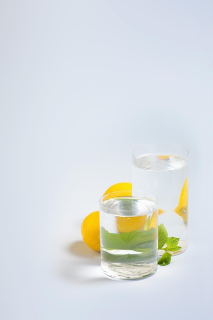 Foods distorted through liquid and glass on blue background