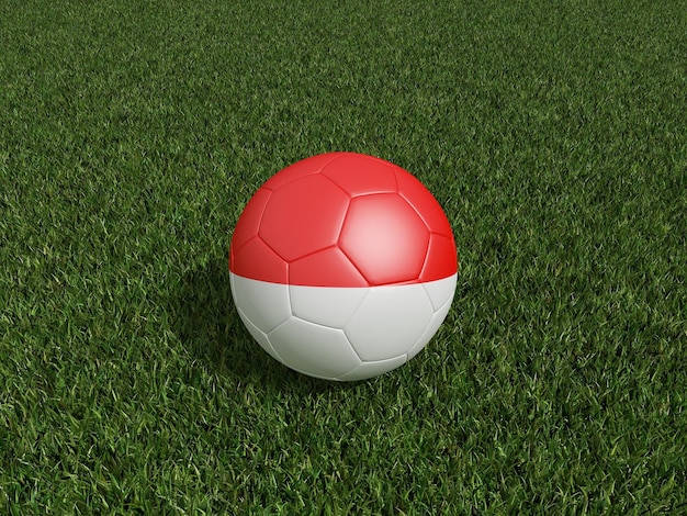 Football in Indonesia flag on green grass 3d rendering