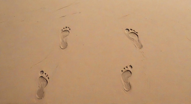 Photo footprints in the sand on a beach