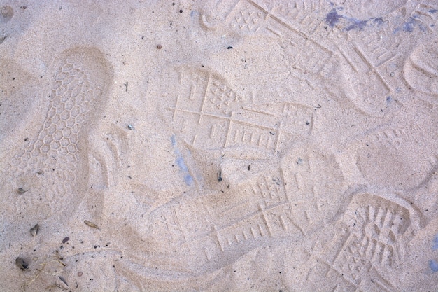 Footprints on sand Footprint pattern on white sand