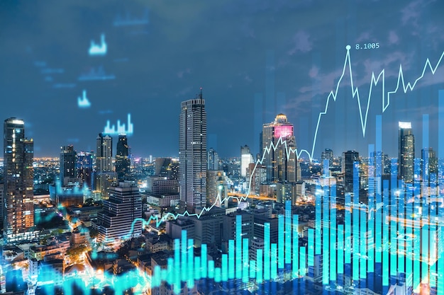 FOREX graph hologram aerial night panoramic cityscape of Bangkok the developed location for stock market researchers in Southeast Asia The concept of fundamental analysis Double exposure