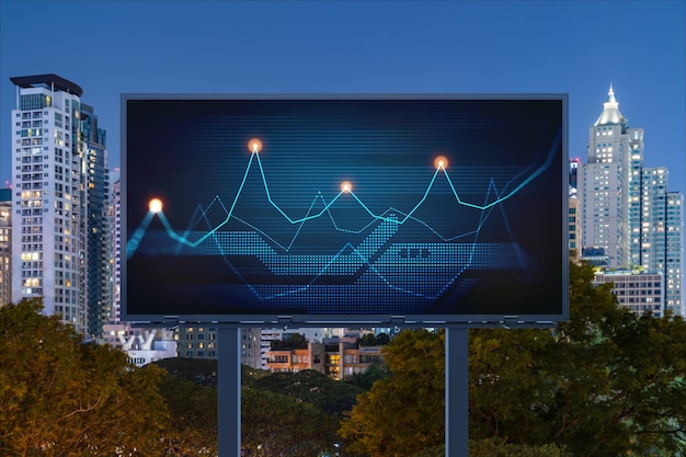 FOREX graph hologram on billboard aerial night panoramic cityscape of Bangkok The developed location for stock market researchers in Southeast Asia The concept of fundamental analysis