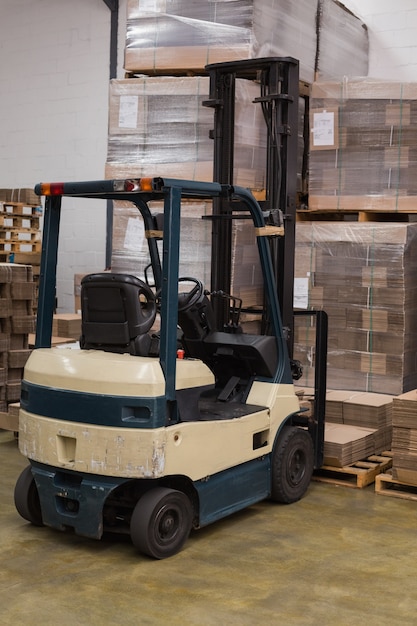 Forklift in a large warehouse