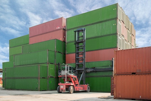 Forklift lifting container box loading to container depot