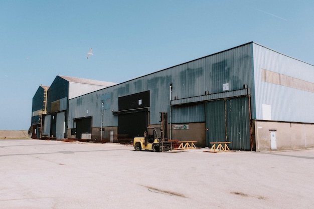 Forklift outside a Warehouse Stock Photo