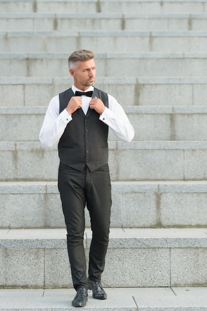 Formal party. He got style. Gentleman modern style. Guy well groomed handsome bearded gentleman macho wear shirt and vest. Barber shop for groom. Confidence in his posture. Elegant gentleman.