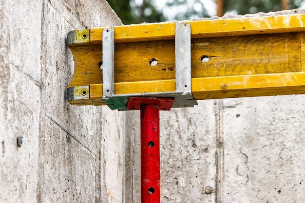 Formwork for pouring the second floor of a monolithic building Reinforcement of walls and ceiling Monolithic work during the construction of a building closeup Construction technologies