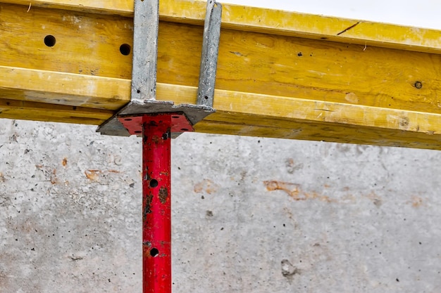 Formwork for pouring the second floor of a monolithic building Reinforcement of walls and ceiling Monolithic work during the construction of a building closeup Construction technologies