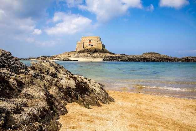 Fortified castel Fort du Petit Be beach and sea SaintMalo city Brittany France