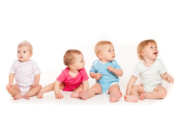 Four babies isolated isolated on white background