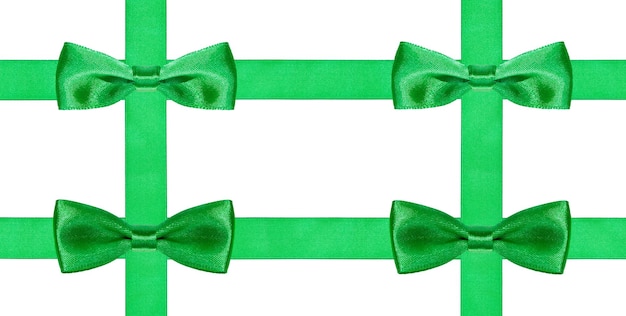 Four big green bow knots on four satin ribbons