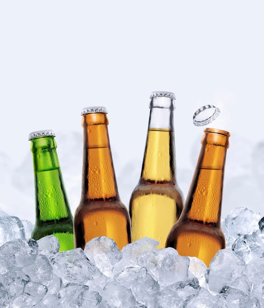 Four bottles of beer in ice cubes isolated on white background 3d render