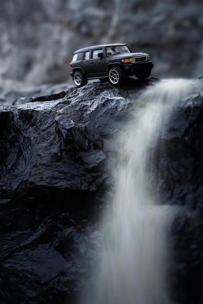 Four by four off road car crossing the lake on mountain road Travel and racing concept for four wheel drive off road vehicle