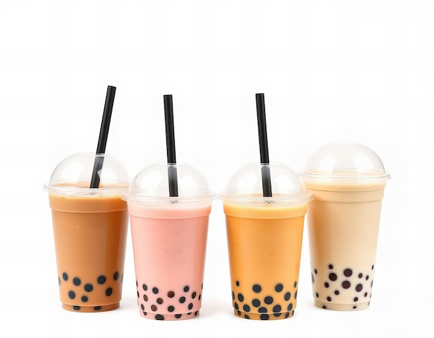 Photo four different colored drinks with black straws and one pink one with black straws