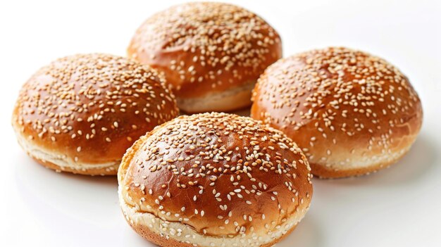 Four hamburger buns with sesame isolated on white background