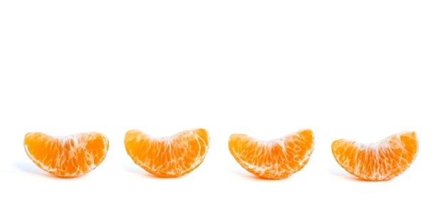 Four organic tangerine shogun flesh isolated on white background