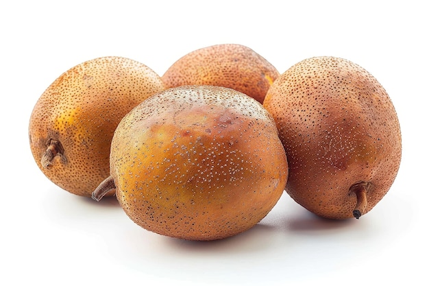 Photo four sapodilla fruits against a white backdrop