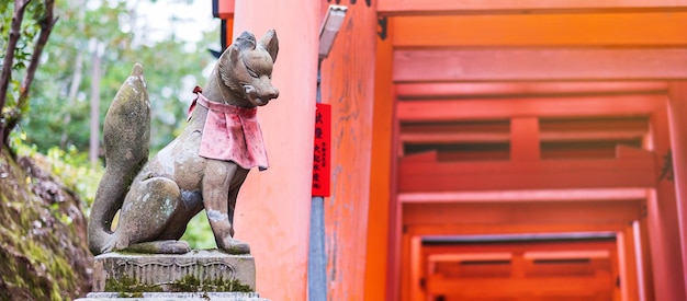 Fox sculpture in Fushimi Inaritaisha shrine in fall autumn season located in Fushimiku landmark and popular for tourists attractions in Kyoto Kyoto Japan 27 November 2019