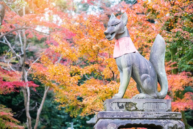 Fox sculpture in Fushimi Inaritaisha shrine in fall autumn season located in Fushimiku landmark and popular for tourists attractions in Kyoto Kyoto Japan 27 November 2019