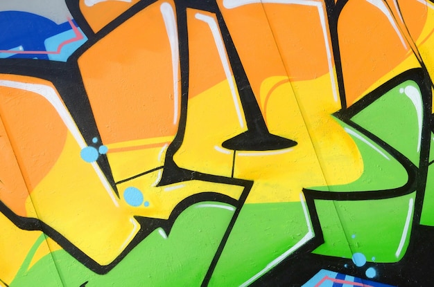 Fragment of colored street art graffiti paintings with contours and shading close up