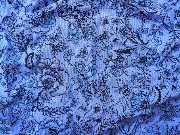 Photo fragment of colorful retro tapestry textile pattern with floral ornament useful as background