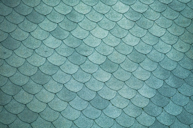 Fragment of Scandinavian tiled roof background