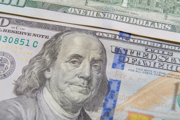 Fragments of dollar bills, very close-up. Horizontal photo