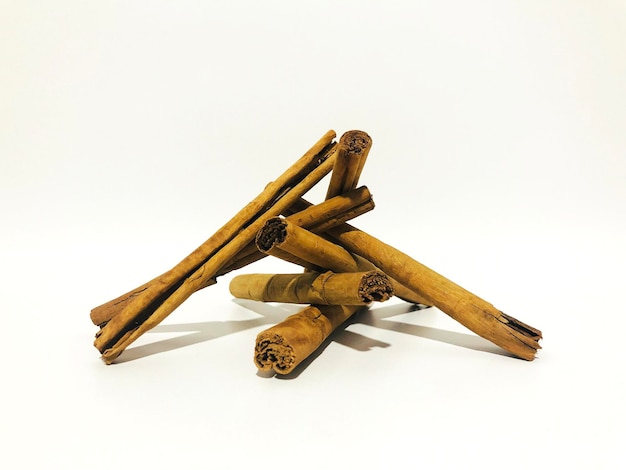 Fragrant cinnamon sticks on a white background